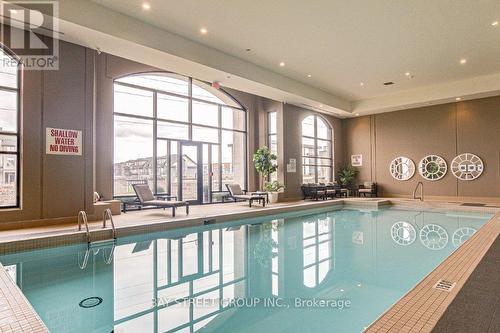 605 - 240 Villagewalk Boulevard, London, ON - Indoor Photo Showing Other Room With In Ground Pool