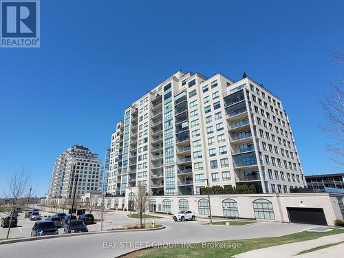 605 - 240 Villagewalk Boulevard, London, ON - Outdoor With Balcony With Facade