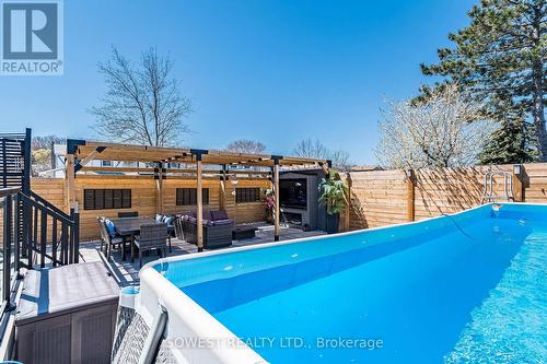123 Dewitt Road, Hamilton, ON - Outdoor With Above Ground Pool