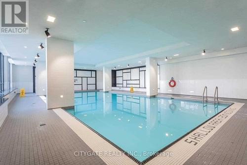 #519 -4011 Brickstone Mews, Mississauga, ON - Indoor Photo Showing Other Room With In Ground Pool