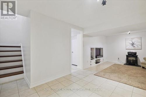 3162 Cantelon Cres, Mississauga, ON - Indoor With Fireplace