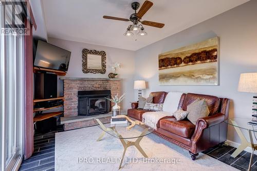 16 Jerome Cres, Brampton, ON - Indoor Photo Showing Living Room With Fireplace