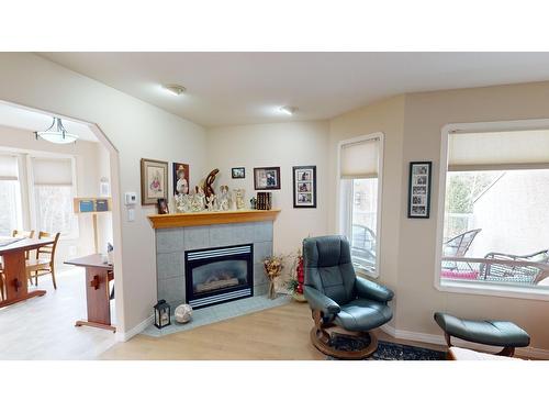 16 - 617 27Th Avenue S, Cranbrook, BC - Indoor Photo Showing Living Room With Fireplace