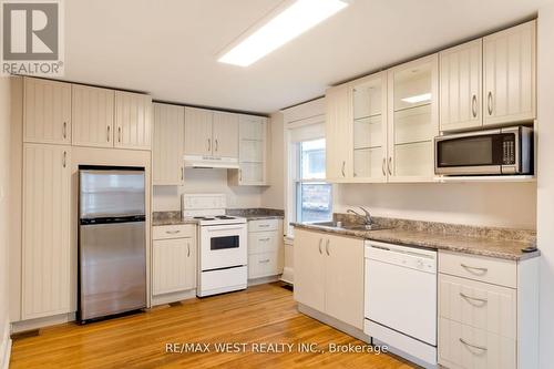 96 Roncesvalles Avenue, Toronto (High Park-Swansea), ON - Indoor Photo Showing Kitchen With Double Sink