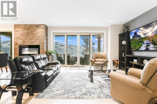 5857 Vicary Road, Peachland, BC - Indoor Photo Showing Living Room With Fireplace