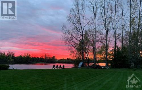 Sunsets and the fire - 1700 Lakeshore Drive, Greely, ON - Outdoor With Body Of Water With View