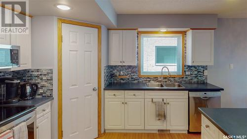 3566 Waddell Crescent E, Regina, SK - Indoor Photo Showing Kitchen With Double Sink