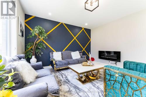80 Doon Creek Street, Kitchener, ON - Indoor Photo Showing Living Room With Fireplace