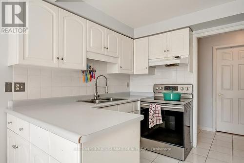 305 - 67 Caroline Street S, Hamilton, ON - Indoor Photo Showing Kitchen With Double Sink
