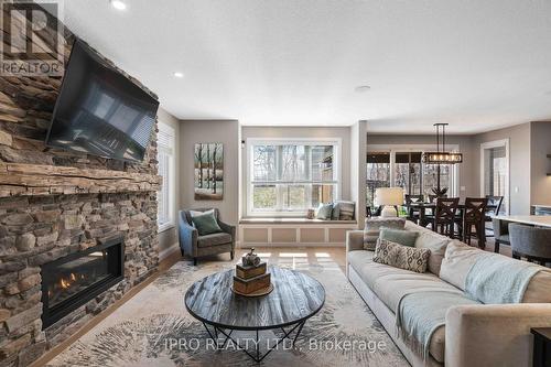 30 Tindall Cres, East Luther Grand Valley, ON - Indoor Photo Showing Living Room With Fireplace