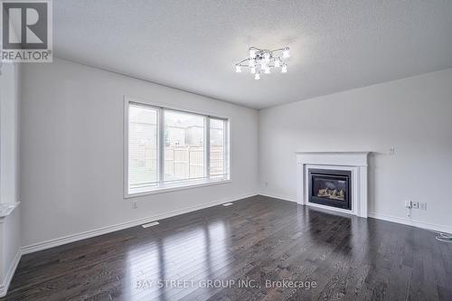 10 Rugman Cres, Springwater, ON - Indoor Photo Showing Living Room With Fireplace