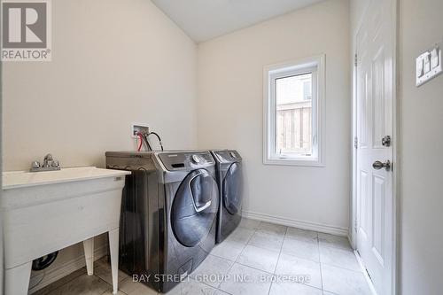 10 Rugman Cres, Springwater, ON - Indoor Photo Showing Laundry Room