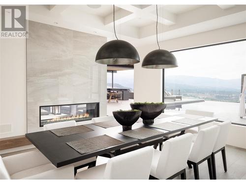 1372 Mine Hill Drive, Kelowna, BC - Indoor Photo Showing Dining Room With Fireplace