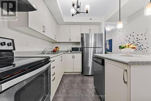 #5-01 -2420 Baronwood Dr, Oakville, ON - Indoor Photo Showing Kitchen With Stainless Steel Kitchen