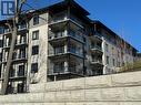 #407 -17 Cleave Ave, Prince Edward County, ON  - Outdoor With Balcony With Facade 