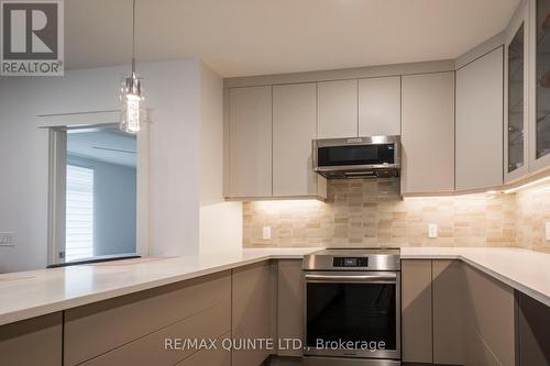 407 - 17 Cleave Avenue, Prince Edward County, ON - Indoor Photo Showing Kitchen With Upgraded Kitchen