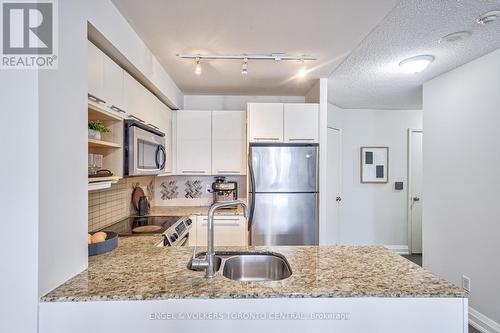 #1710 -21 Carlton St, Toronto, ON - Indoor Photo Showing Kitchen With Double Sink