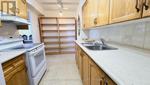 315 - 2825 Islington Avenue, Toronto (Humber Summit), ON - Indoor Photo Showing Kitchen With Double Sink