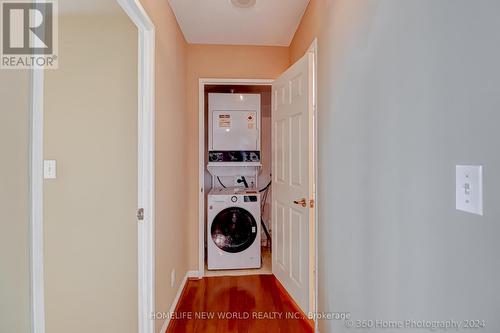 #Ph#105 -1 Lee Centre Dr, Toronto, ON - Indoor Photo Showing Laundry Room