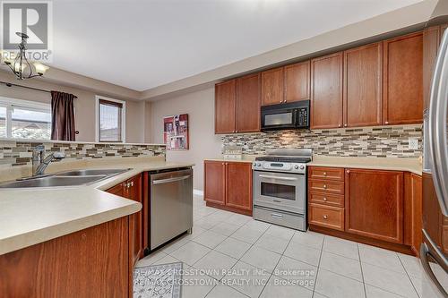 56 The Queensway, Barrie, ON - Indoor Photo Showing Kitchen With Double Sink