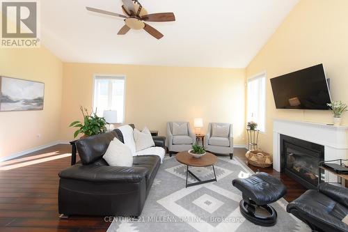 12 Surfside Cres, Collingwood, ON - Indoor Photo Showing Living Room With Fireplace
