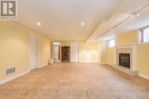 23 Bourgeois Beach Rd, Tay, ON - Indoor Photo Showing Other Room With Fireplace