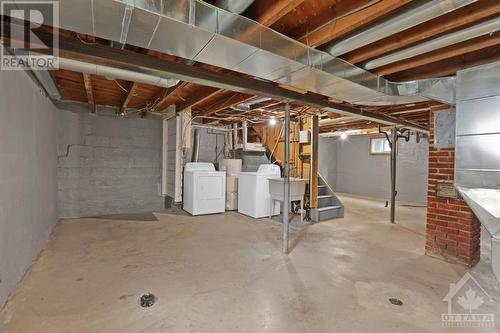 Large basement with rough in & side entrance door - 218 Main Street, Ottawa, ON - Indoor Photo Showing Basement