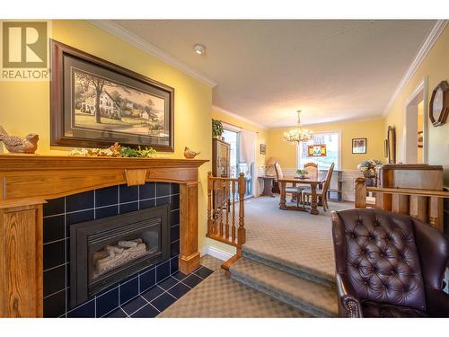 3808 Forsyth Drive, Penticton, BC - Indoor Photo Showing Living Room With Fireplace