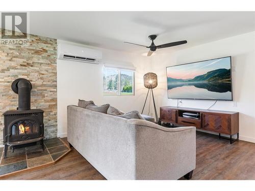1221 Green Lake Road, Oliver, BC - Indoor Photo Showing Living Room With Fireplace