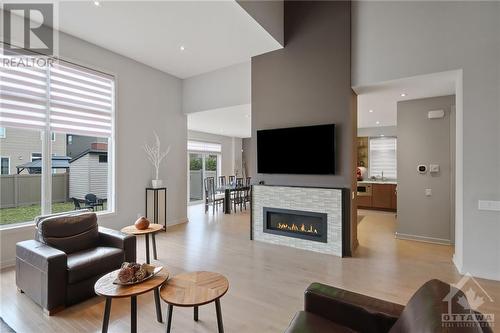 235 Sunnyridge Crescent, Ottawa, ON - Indoor Photo Showing Living Room With Fireplace