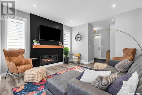 546 Burgess Crescent, Saskatoon, SK - Indoor Photo Showing Living Room With Fireplace
