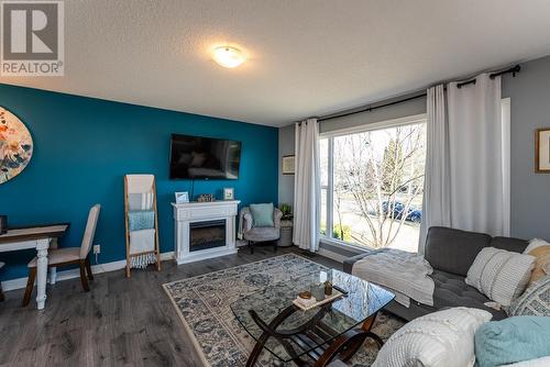 4319 Eaglenest Crescent, Prince George, BC - Indoor Photo Showing Living Room With Fireplace