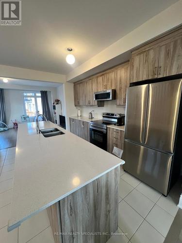 76 Foxsparrow Rd, Brampton, ON - Indoor Photo Showing Kitchen With Double Sink