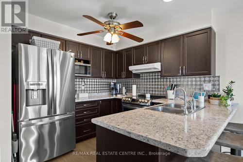 8 Wade Green, Cambridge, ON - Indoor Photo Showing Kitchen With Double Sink With Upgraded Kitchen
