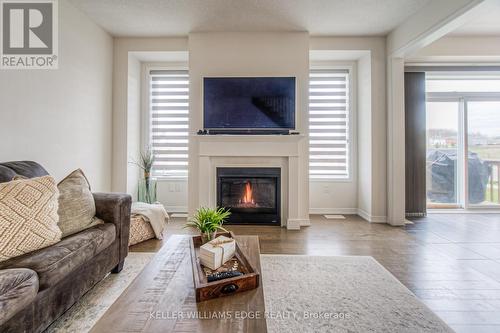 25 Anderson Rd, Brantford, ON - Indoor Photo Showing Living Room With Fireplace