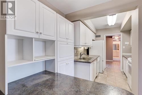2312 - 1333 Bloor Street, Mississauga, ON - Indoor Photo Showing Kitchen With Double Sink