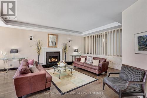 #2312 -1333 Bloor St, Mississauga, ON - Indoor Photo Showing Living Room With Fireplace