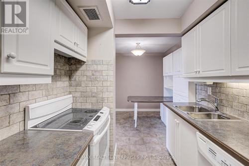 2312 - 1333 Bloor Street, Mississauga, ON - Indoor Photo Showing Kitchen With Double Sink