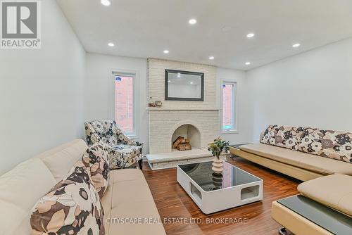 32 Pennsylvania Ave, Brampton, ON - Indoor Photo Showing Living Room With Fireplace