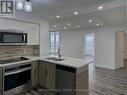 #2208 -4090 Living Arts Dr, Mississauga, ON  - Indoor Photo Showing Kitchen With Double Sink 