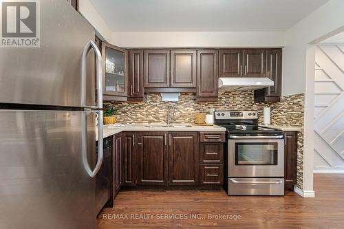 #84 -60 Hanson Rd, Mississauga, ON - Indoor Photo Showing Kitchen With Double Sink