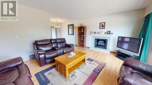 11412 92 Street, Fort St. John, BC - Indoor Photo Showing Living Room With Fireplace
