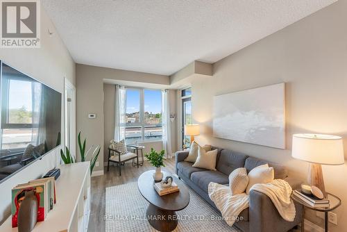 #506 -22 East Haven Dr, Toronto, ON - Indoor Photo Showing Living Room