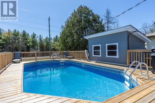 905 Gilchrist Bay Rd, Douro-Dummer, ON - Outdoor With Above Ground Pool With Deck Patio Veranda