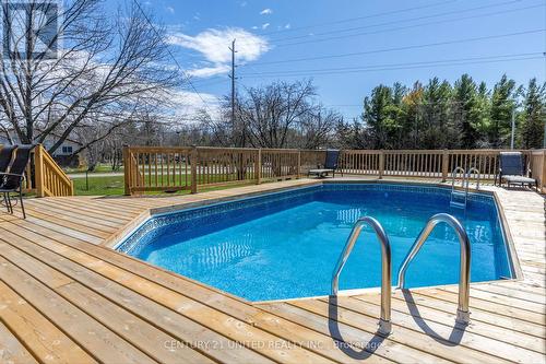 905 Gilchrist Bay Rd, Douro-Dummer, ON - Outdoor With Above Ground Pool With Deck Patio Veranda With Backyard