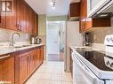 3100 Kirwin Avenue Unit# 2504, Mississauga, ON  - Indoor Photo Showing Kitchen With Double Sink 