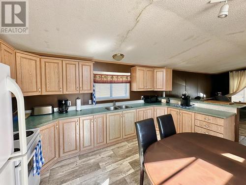 21 3128 Hooker Road, Williams Lake, BC - Indoor Photo Showing Kitchen With Double Sink