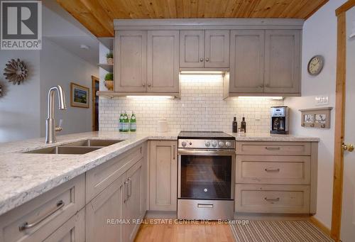 8 - 1054 Cove Road, Muskoka Lakes, ON - Indoor Photo Showing Kitchen With Double Sink With Upgraded Kitchen