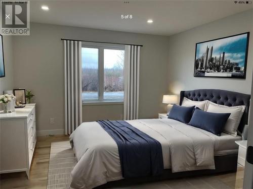 Virtually Staged Primary Bedroom - 5037 Prunner Road, Williamsburg, ON - Indoor Photo Showing Bedroom