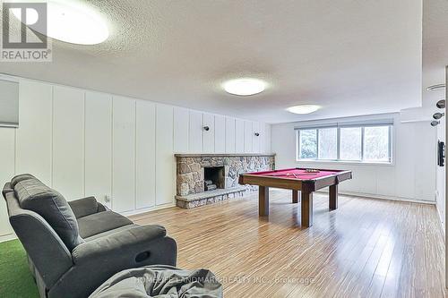 12 Banstock Dr, Toronto, ON - Indoor Photo Showing Other Room With Fireplace